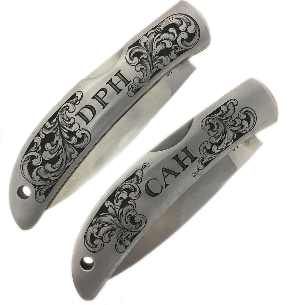 hand engraved initials with scroll by bill oyster bamboo fly rods al mar knives