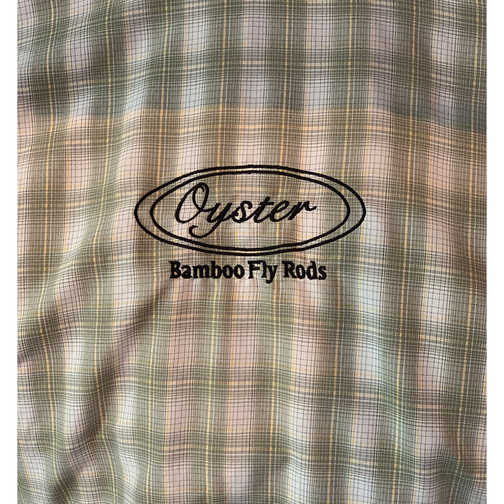 Simms Big Sky Long Sleeve Shirt in dark khaki plaid featuring Oyster fly rods logo.