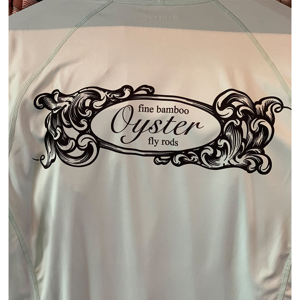 oyster bamboo fly rods scroll logo on simms solarflex fishing shirts