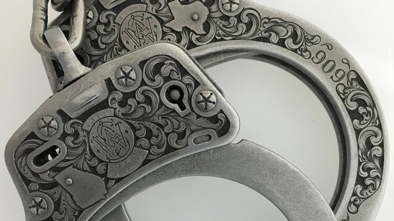 Hand engraved handcuffs