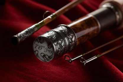 7'6" 3wt bamboo fly rod with hand engraved scroll on nickel silver butt cap, rod seat, and ferrule.