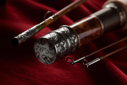 7'6" 3wt bamboo fly rod with hand engraved scroll on nickel silver butt cap, rod seat, and ferrule.
