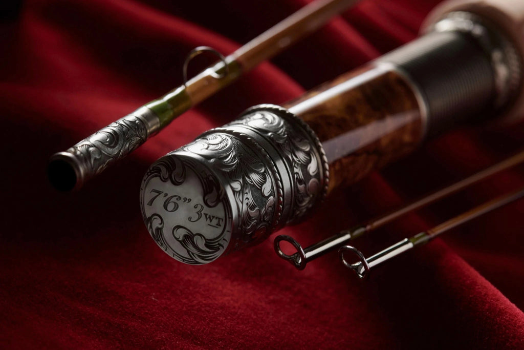 7'6" 3wt bamboo fly rod with hand engraved scroll on nickel silver butt cap, rod seat, and ferrule.