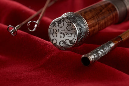 8' 5wt bamboo fly rod with hand engraved scroll butt cap and ferrules from Oyster Bamboo. 