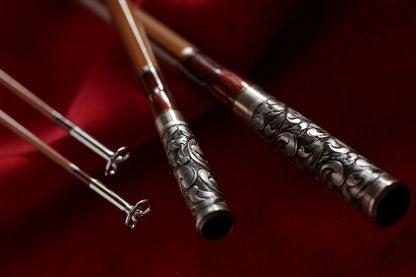 8' 5wt bamboo fly rod with hand engraved ferrules.