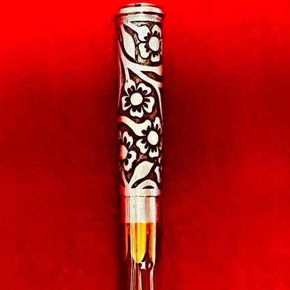 8' 5wt bamboo fly rod with hand engraved floral ferrule. 