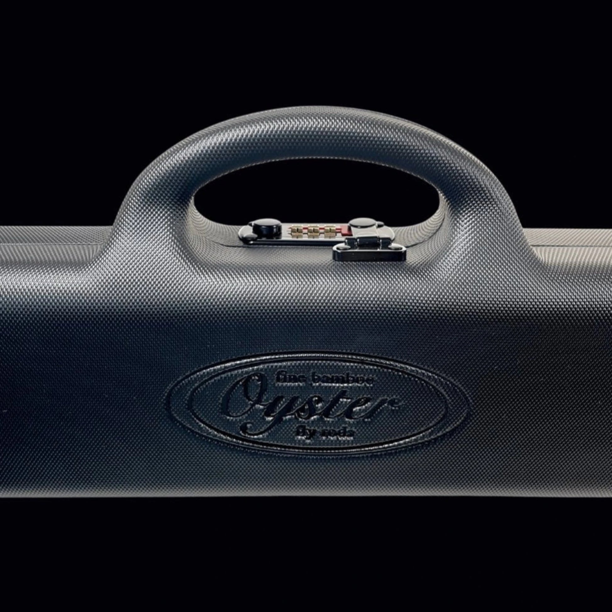 Fly rod black ABS carry case with lock and Oyster Bamboo branding. 