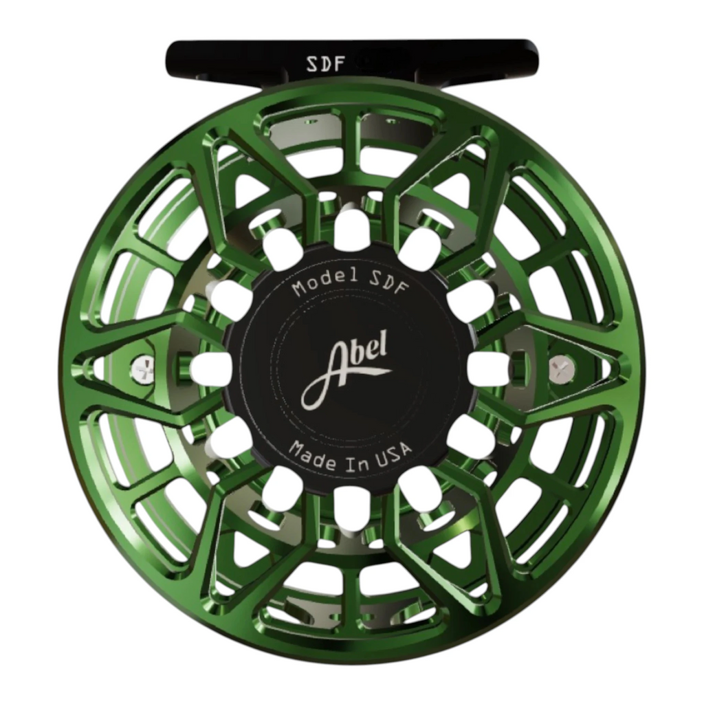 Abel SDF 5/6 weight fly fishing reel with ported, deep green frame and black drag knob. 