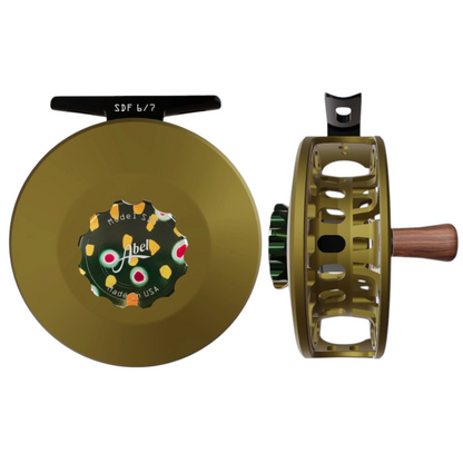 Abel SDF 6/7 weight fly fishing reel with solid satin dark olive and native brook trout drag knob.