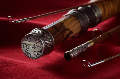 7'6" 4wt bamboo fly rod with hand engraved scroll on butt cap and ferrules.