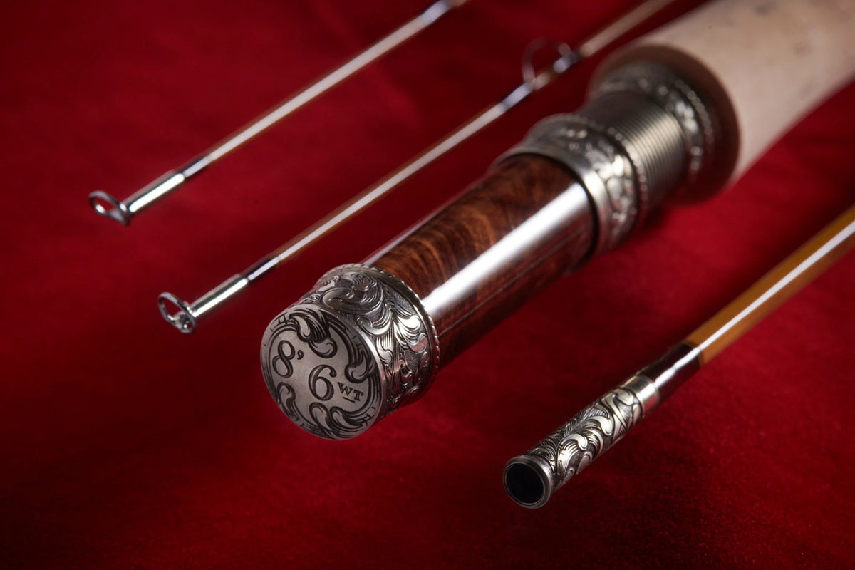 8' 6wt bamboo fly rod with hand engraved scroll on butt cap and ferrules from Oyster Bamboo. 