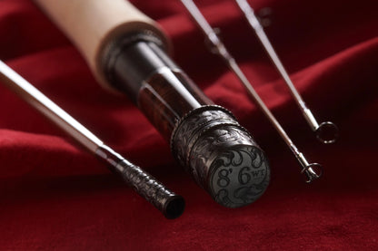 8' 6wt bamboo fly rod with hand engraved scroll nickel silver butt cap, rod seat, and ferrule.