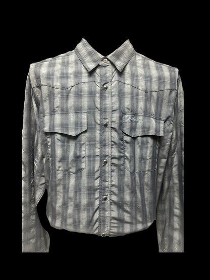 Simms Big Sky long sleeve fishing shirt in black plaid with pockets.