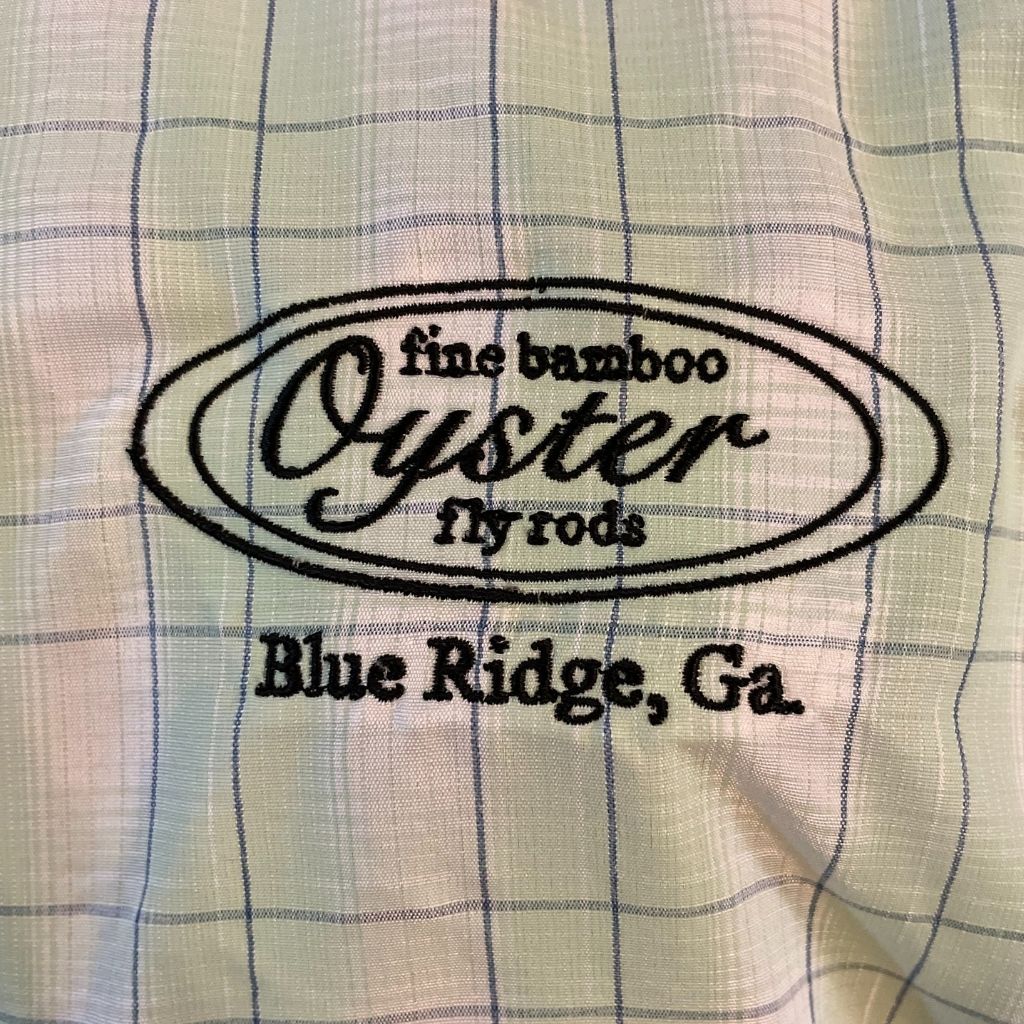 Simms Big Sky Long Sleeve Shirt in light green,night fall plaid featuring Oyster fly rods logo.