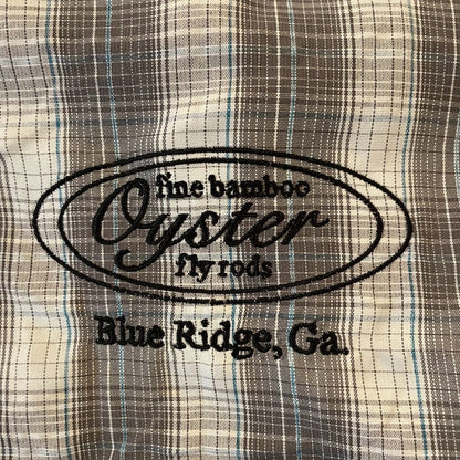 Simms Big Sky Short Sleeve Shirt in steel/pool plaid featuring Oyster fly rods logo.